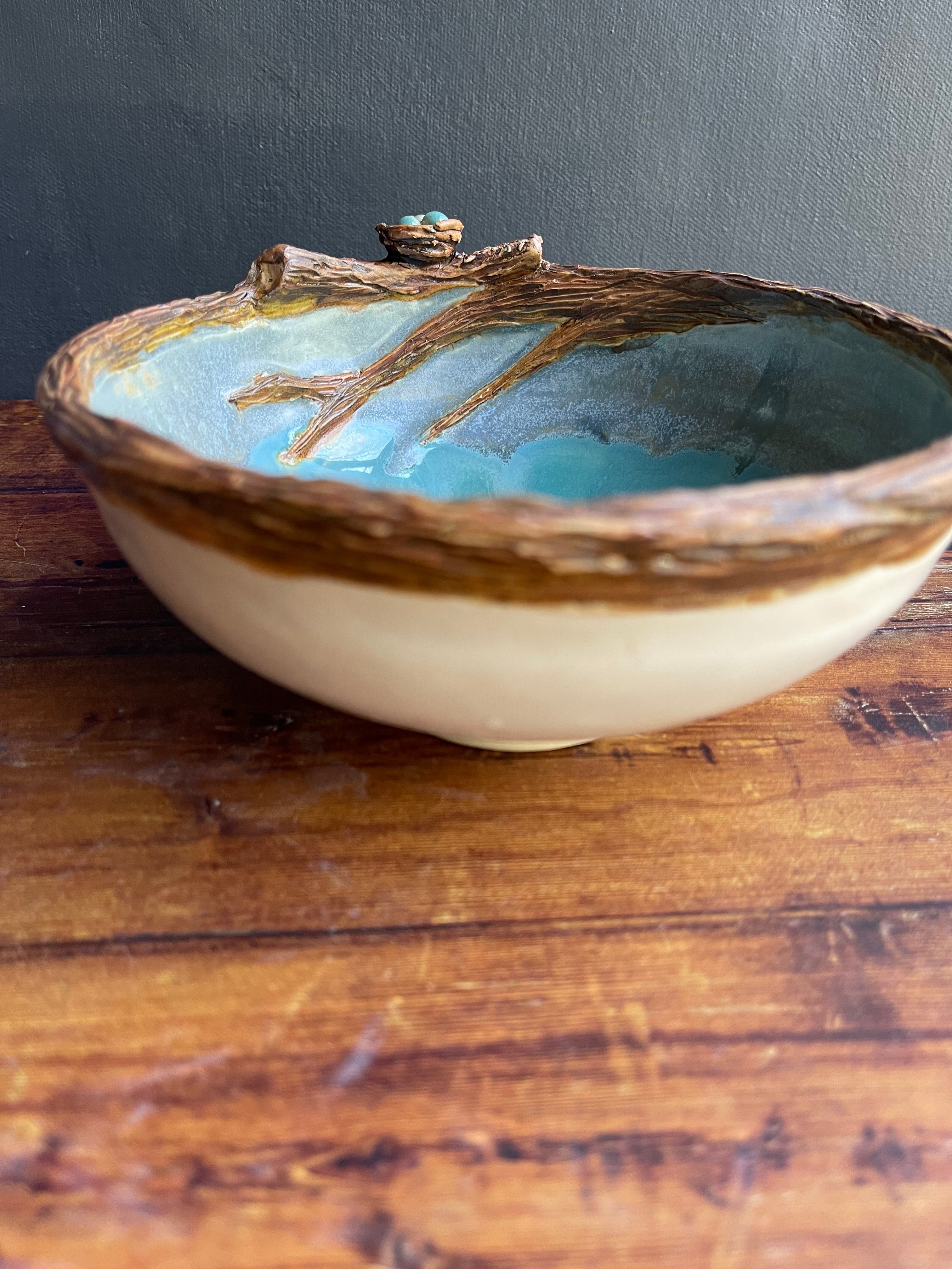 Ceramic bowl with birds nest