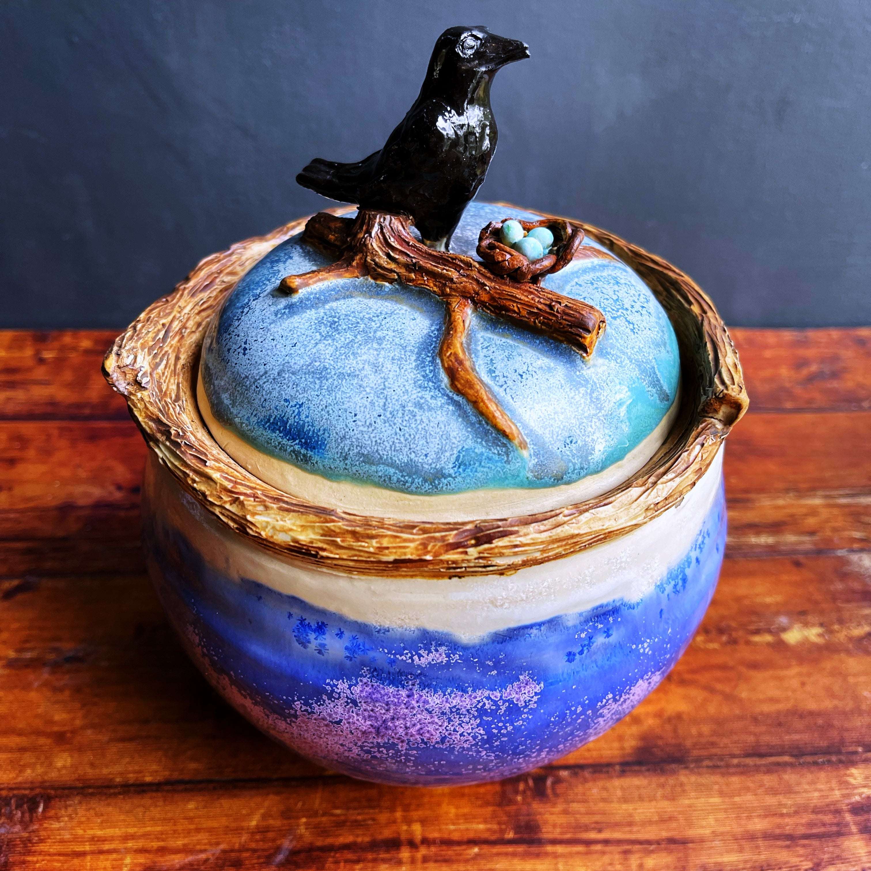 Raven’s nest sculpted ceramic jar