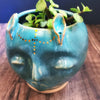 Deer Woman planter with gold luster in Turquoise glaze 4 1/2” H
