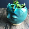 Deer Woman planter with gold luster in Turquoise glaze 4 1/2” H